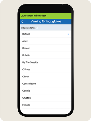 En smartphonesk&auml;rm visar en &rdquo;L&aring;gt glukos-varning&rdquo;-sida med alternativ f&ouml;r ringsignaler