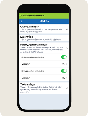 En smartphone visar inst&auml;llningar f&ouml;r glukos&ouml;vervakning med alternativ f&ouml;r varningar